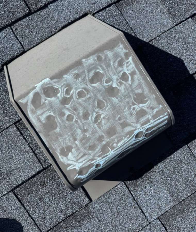 Roof vent covered in hail dents